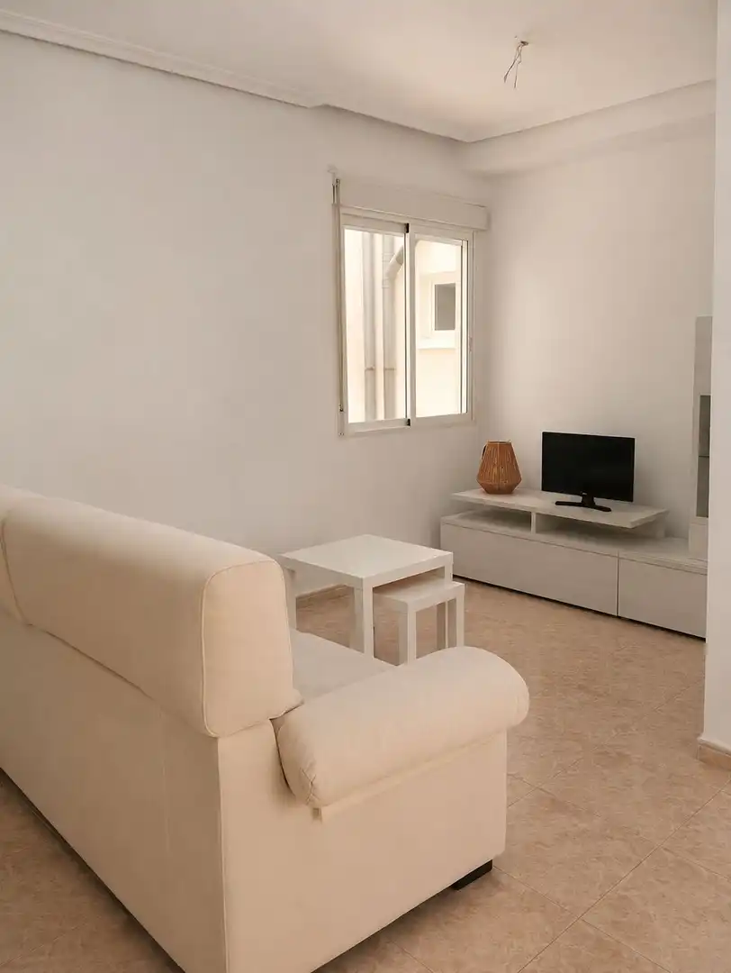 Wohnzimmer von Wohnung zur Miete in Torrevieja mit Klimaanlage, Heizung und Terrasse