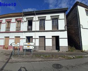 Vista exterior de Casa adosada en venda en Laviana amb Parquet, Moblat i Forn