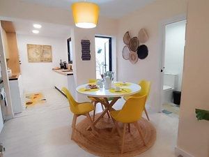 Menjador de Casa adosada en venda en Benalmádena amb Aire condicionat, Terrassa i Moblat