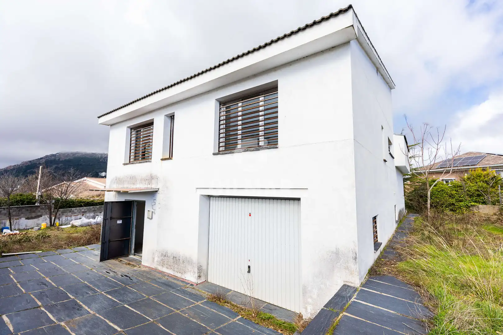Vista exterior de Casa o chalet en venta en Becerril de la Sierra con Calefacción y Jardín privado