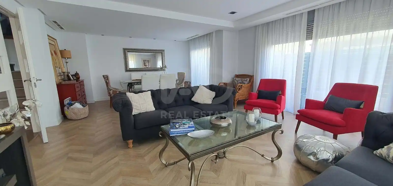 Sala de estar de Casa adosada en venta en Almería con Aire acondicionado, Calefacción y Terraza
