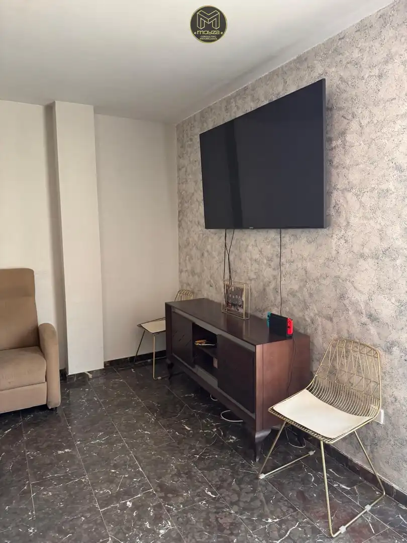 Wohnzimmer von Dachboden zum Verkauf in Martos mit Heizung und Terrasse