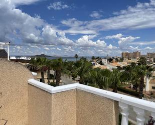 Vista exterior de Dúplex en venda en La Manga del Mar Menor amb Terrassa, Piscina i Balcó