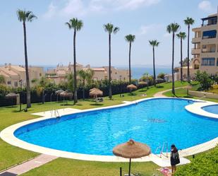 Piscina de Pis de lloguer en Benalmádena amb Aire condicionat, Jardí privat i Terrassa