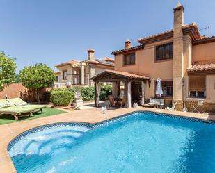 Swimming pool of Single-family semi-detached for sale in La Zubia  with Heating, Private garden and Terrace