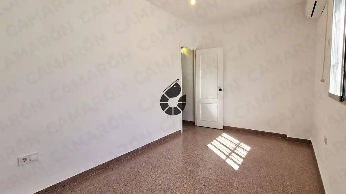 Habitación de Casa adosada en venta en Coria del Río con Aire acondicionado y Trastero