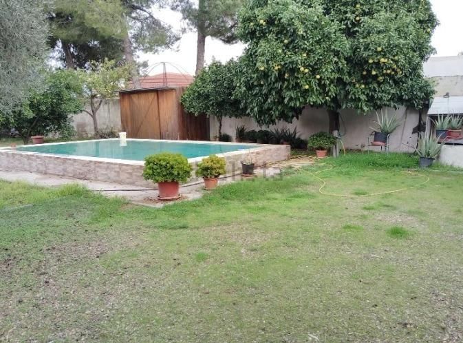 Piscina de Finca rústica en venda en Utrera amb Aire condicionat, Jardí privat i Traster