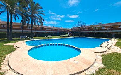 Piscina de Casa adosada en venda en Dénia amb Aire condicionat, Terrassa i Moblat