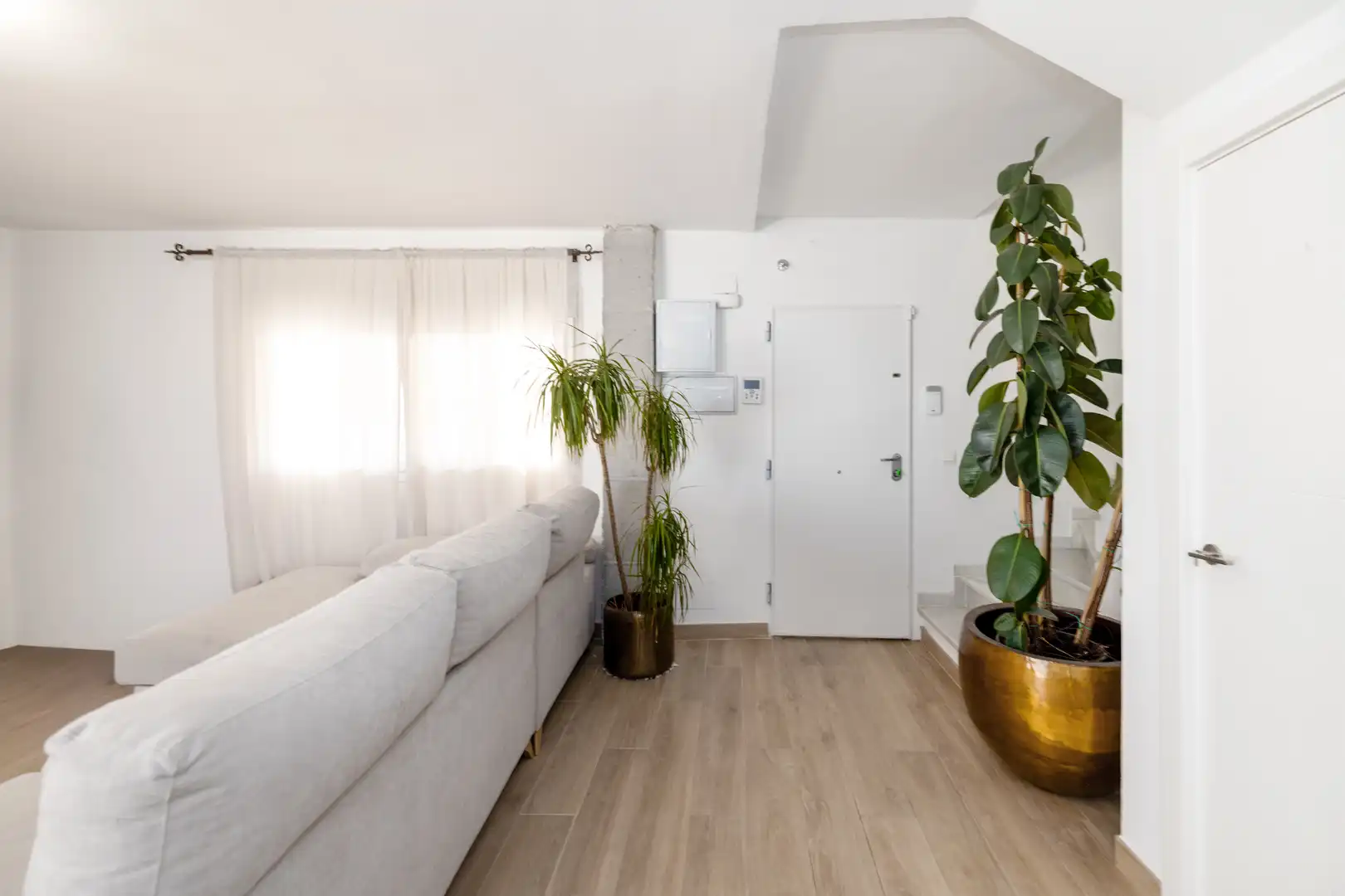 Sala de estar de Casa adosada en venta en Málaga con Aire acondicionado, Calefacción y Jardín privado