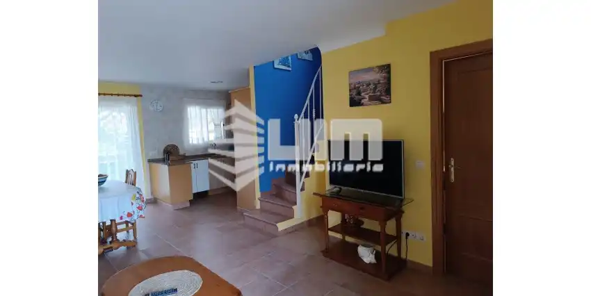 Sala d'estar de Casa adosada en venda en Sagunto / Sagunt amb Terrassa