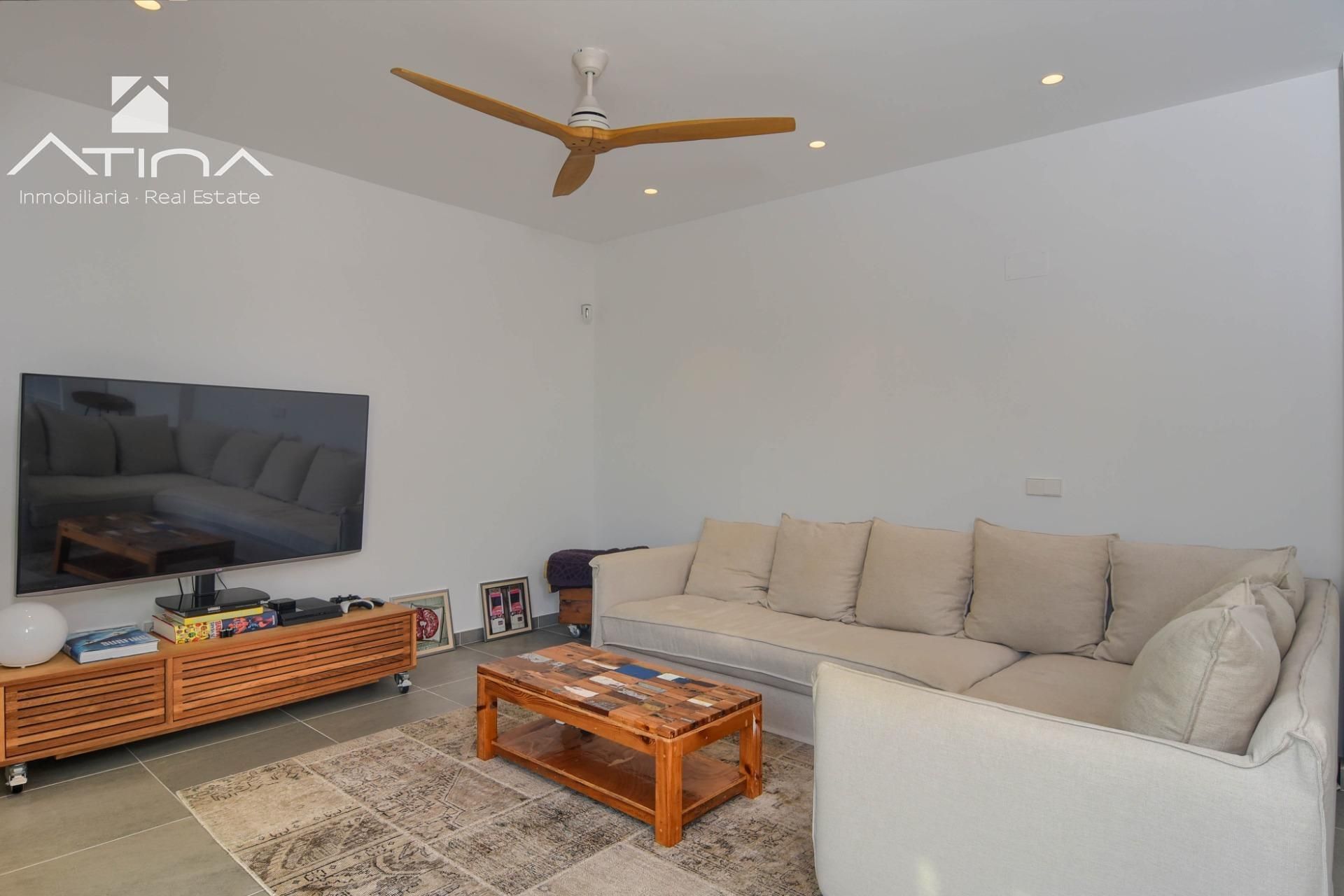 Living room of Planta baja for sale in Jávea / Xàbia  with Air Conditioner, Private garden and Terrace