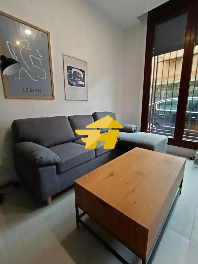 Sala d'estar de Estudi de lloguer en  Córdoba Capital amb Aire condicionat i Moblat