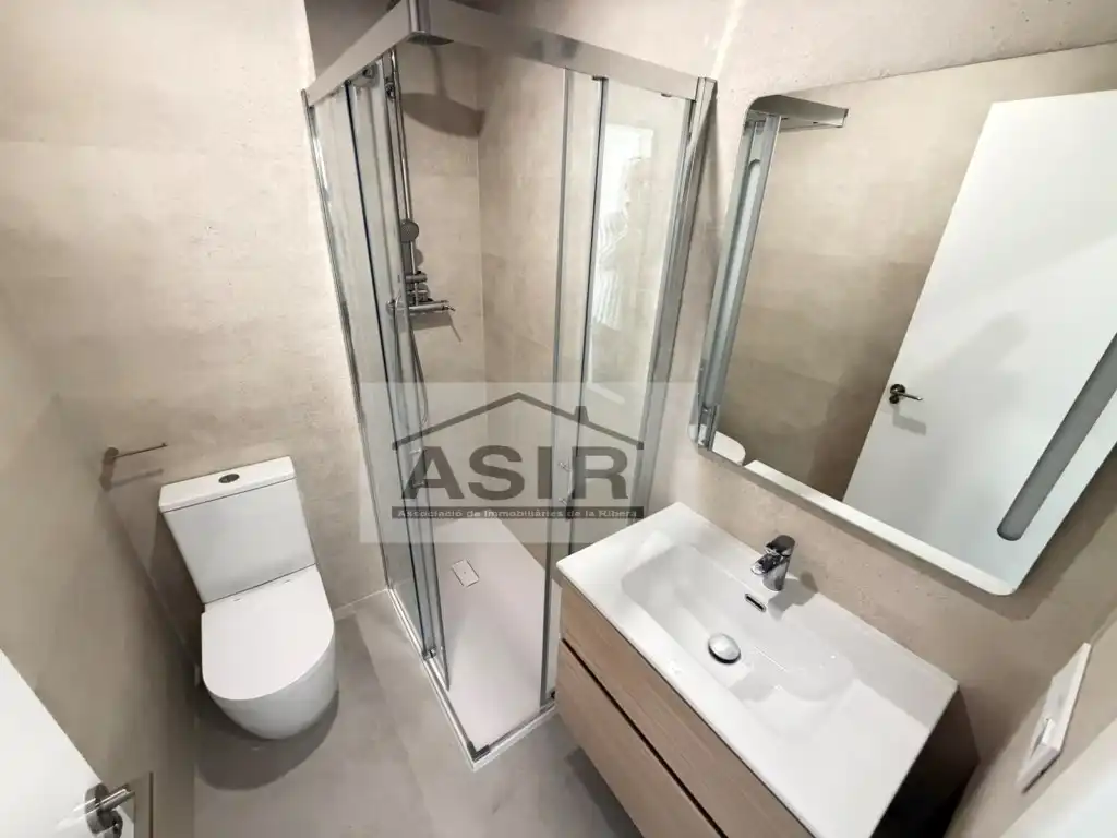 Baño de Piso de alquiler en Polinyà de Xúquer con Piscina