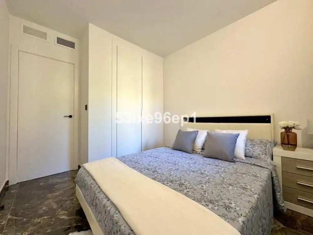 Habitación de Apartamento de alquiler en Marbella con Aire acondicionado, Jardín privado y Terraza