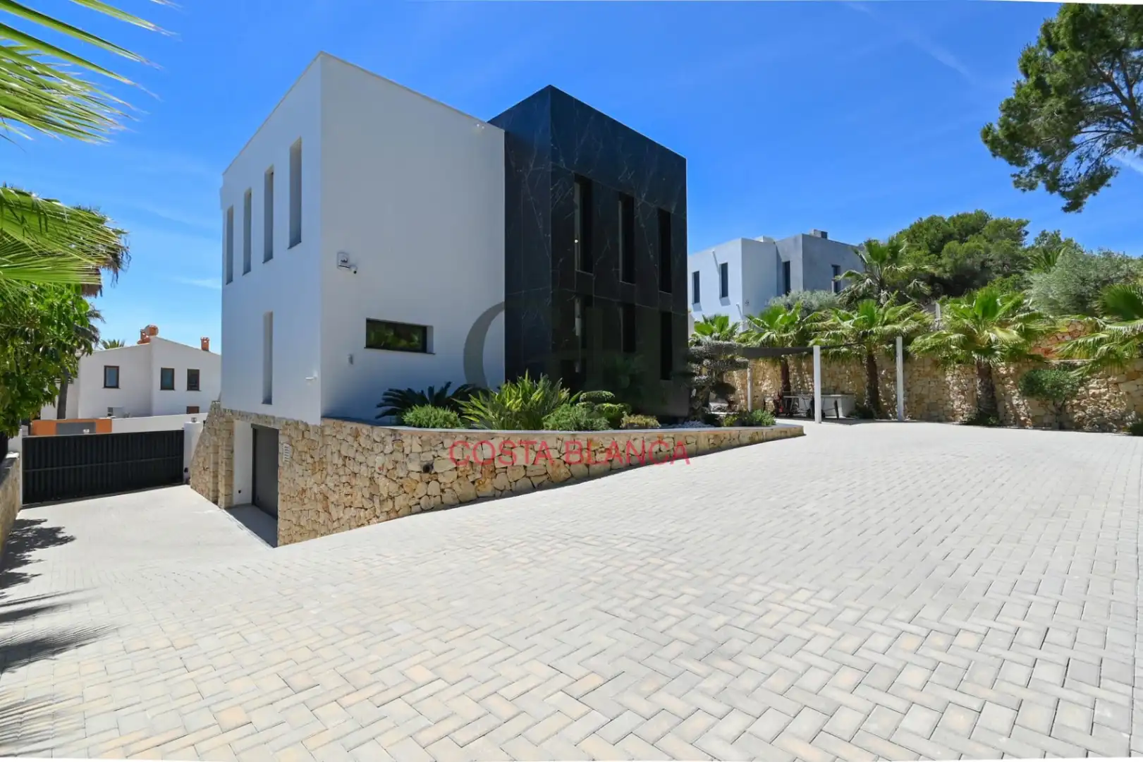 Außenansicht von Haus oder Chalet zum Verkauf in Moraira mit Klimaanlage, Heizung und Privatgarten
