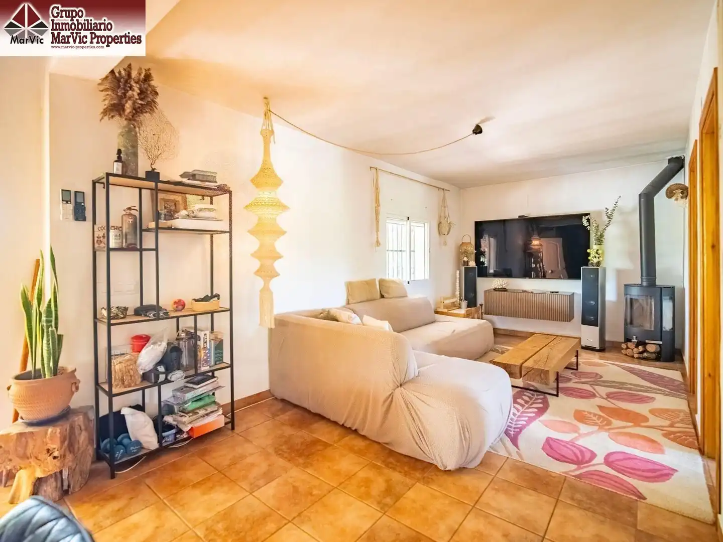 Sala d'estar de Apartament en venda en Callosa d'en Sarrià amb Aire condicionat, Jardí privat i Moblat
