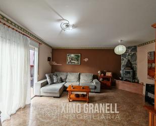 Living room of Single-family semi-detached for sale in La Vall d'Uixó  with Terrace and Furnished