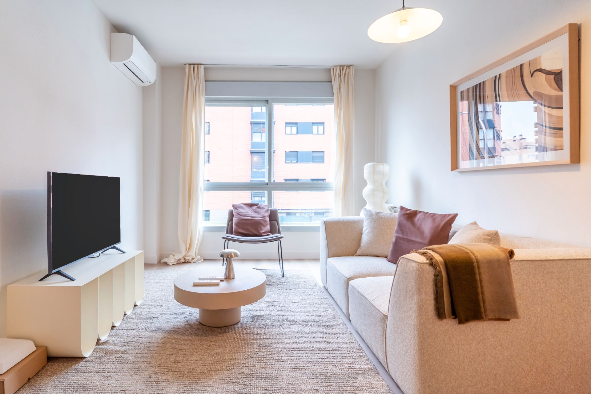 Sala de estar de Piso en venta en  Madrid Capital con Aire acondicionado, Trastero y Piscina comunitaria