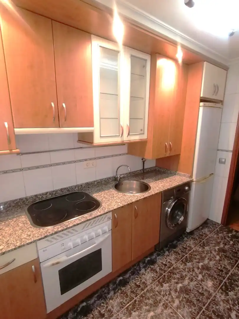 Cuina de Dúplex en venda en Gijón  amb Calefacció, Parquet i Traster