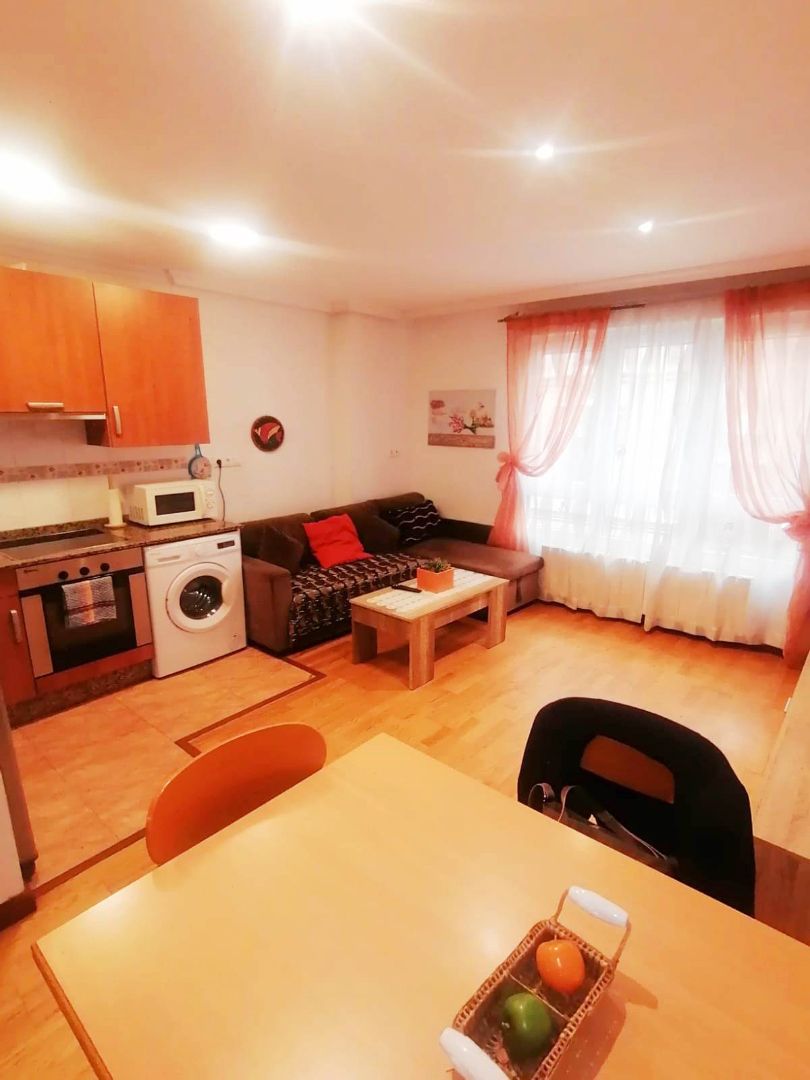 Living room of Apartment for sale in Gijón   with Heating, Parquet flooring and Storage room