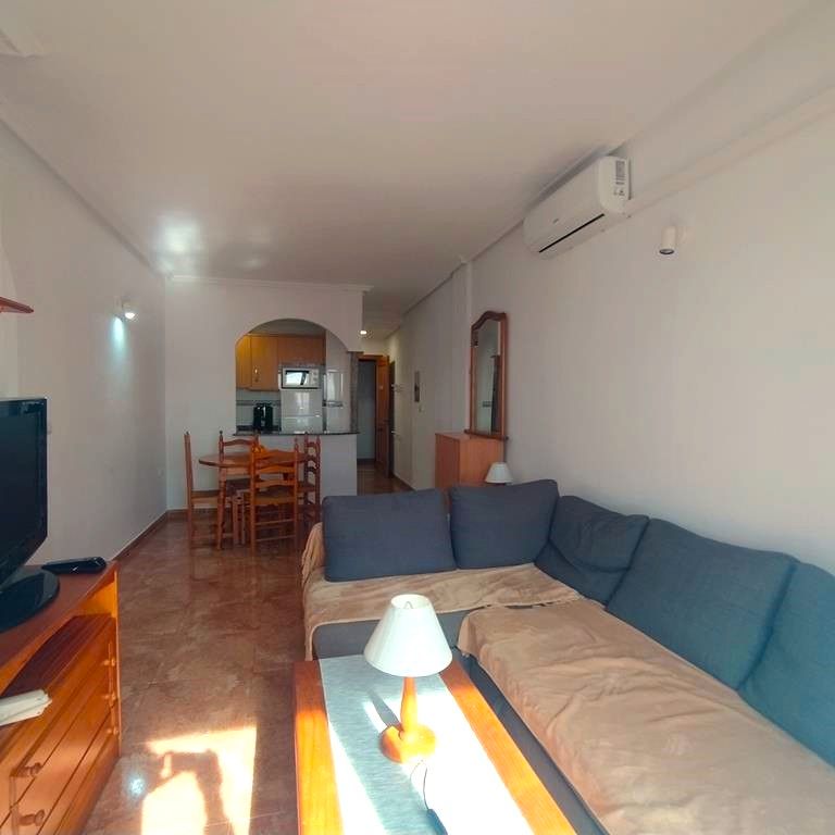 Living room of Flat for sale in Torrevieja  with Air Conditioner, Terrace and Furnished