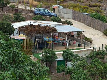 Casa rústica con piscina en venta en Benajarafe