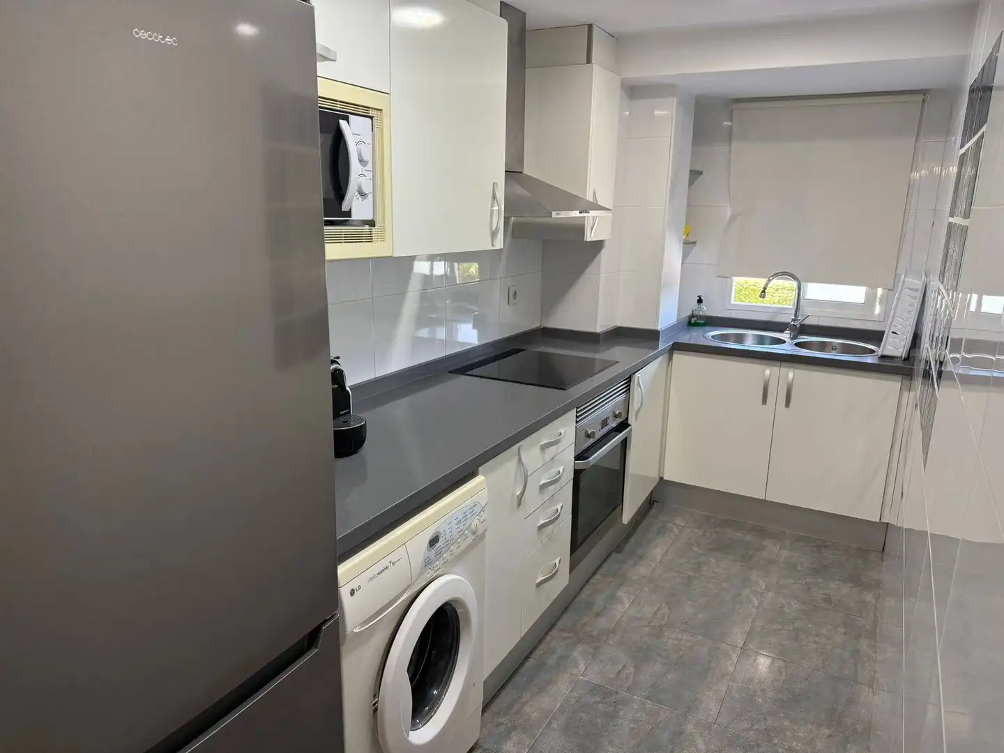 Cuina de Apartament de lloguer en El Puig de Santa Maria amb Aire condicionat, Moblat i Piscina comunitària