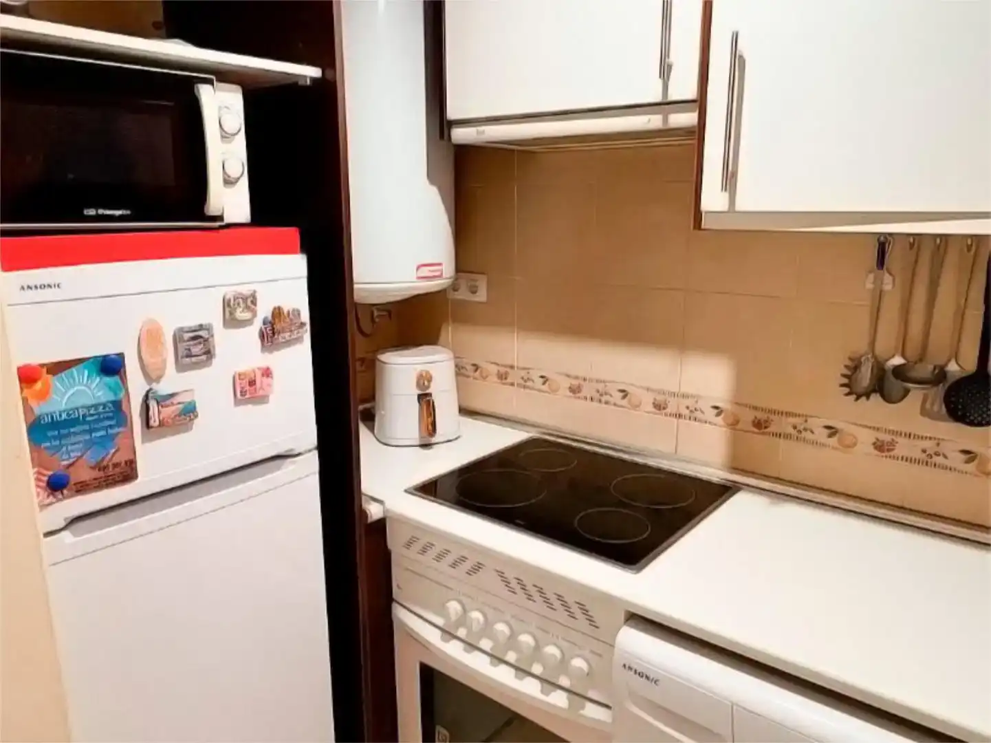 Cocina de Apartamento de alquiler en Bellreguard con Aire acondicionado, Jardín privado y Piscina