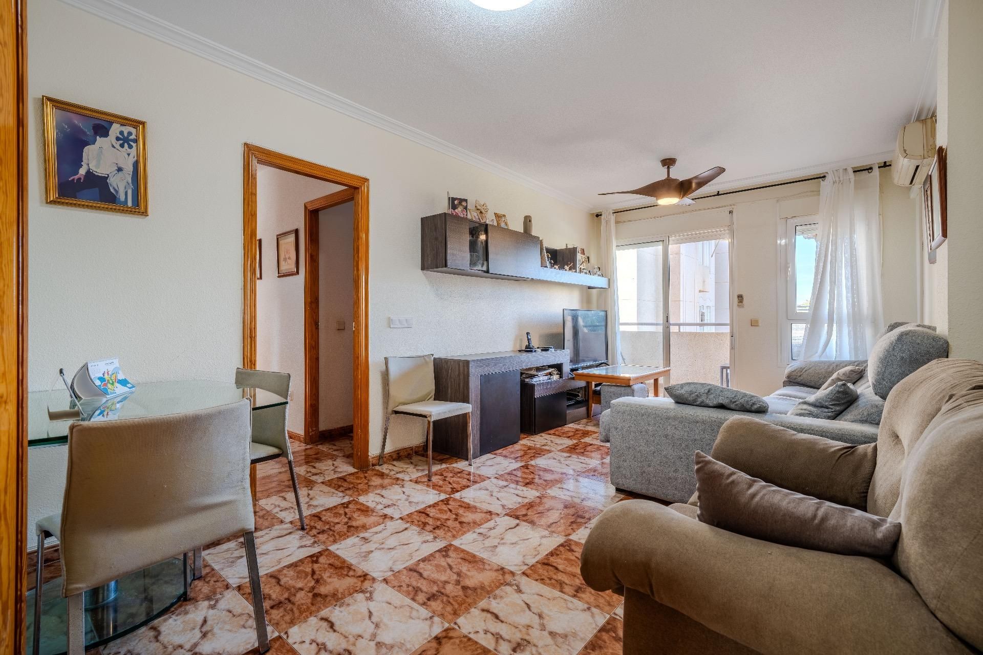 Living room of Flat for sale in Roquetas de Mar  with Air Conditioner, Private garden and Terrace