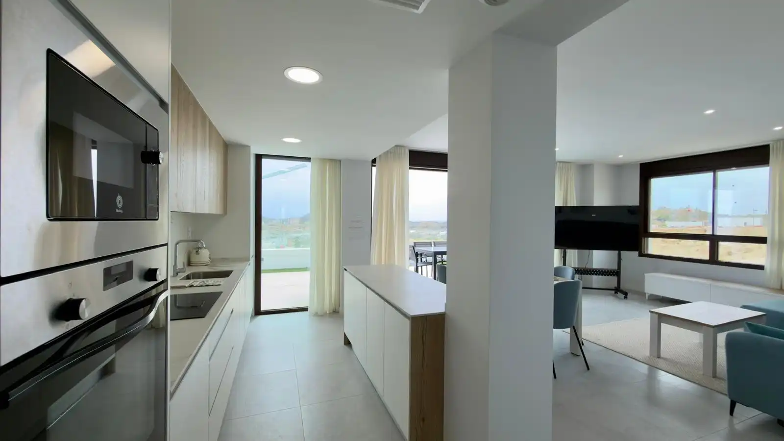 Cuina de Apartament de lloguer en Finestrat amb Aire condicionat, Jardí privat i Terrassa