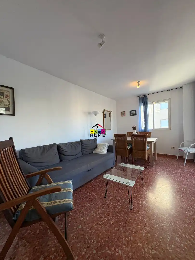 Sala d'estar de Apartament en venda en Benicasim / Benicàssim amb Aire condicionat, Jardí privat i Moblat