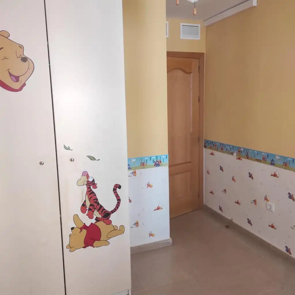 Dormitori de Pis de lloguer en Rincón de la Victoria amb Piscina