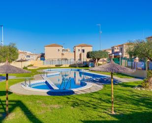 Swimming pool of Single-family semi-detached for sale in Torrevieja  with Terrace, Furnished and Community pool