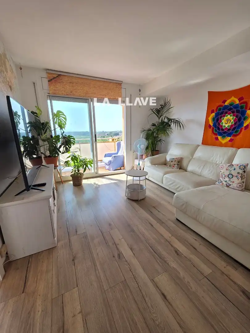 Sala de estar de Piso en venta en Blanes con Calefacción, Terraza y Piscina