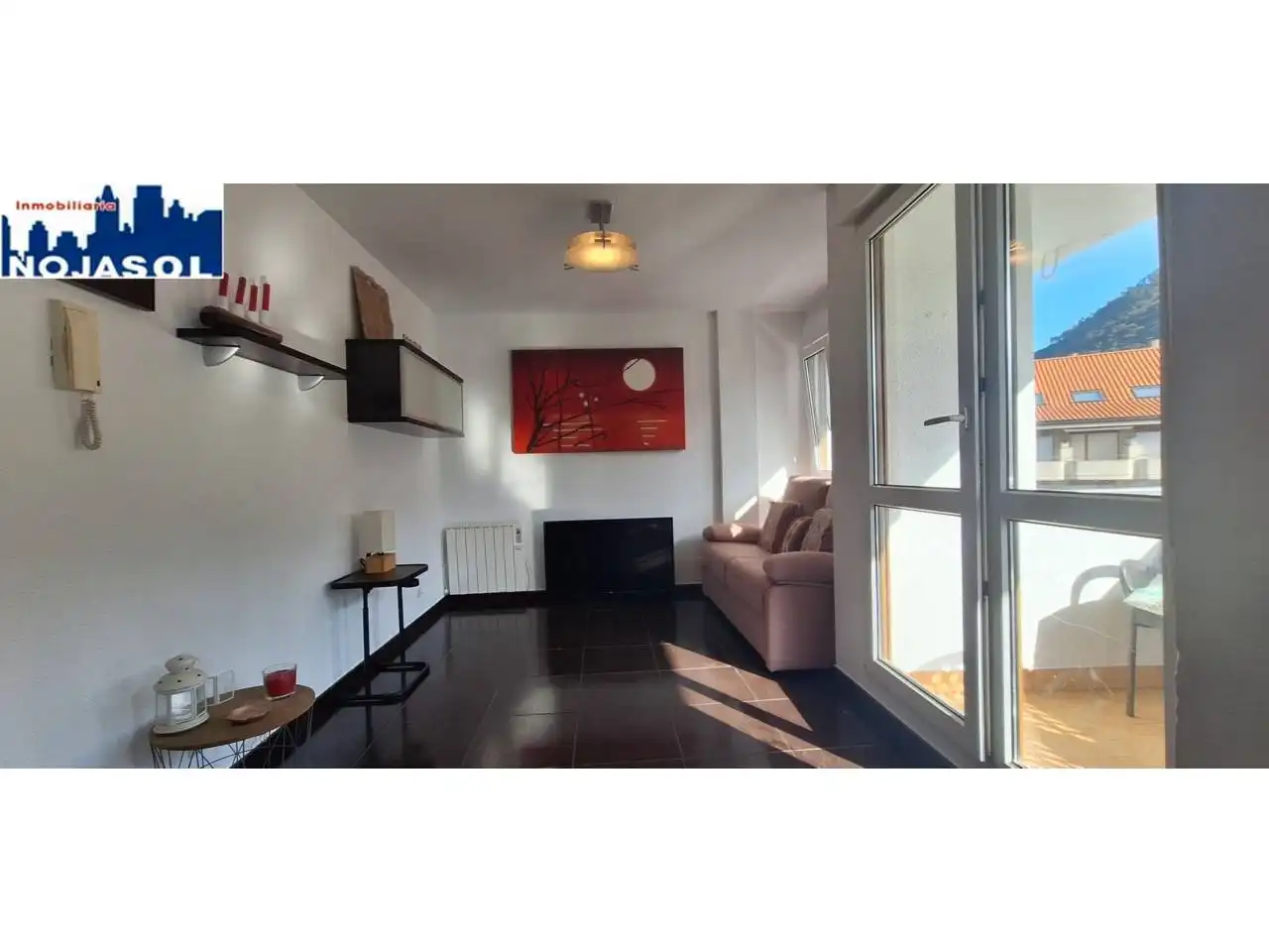 Sala d'estar de Apartament de lloguer en Noja amb Calefacció, Terrassa i Moblat