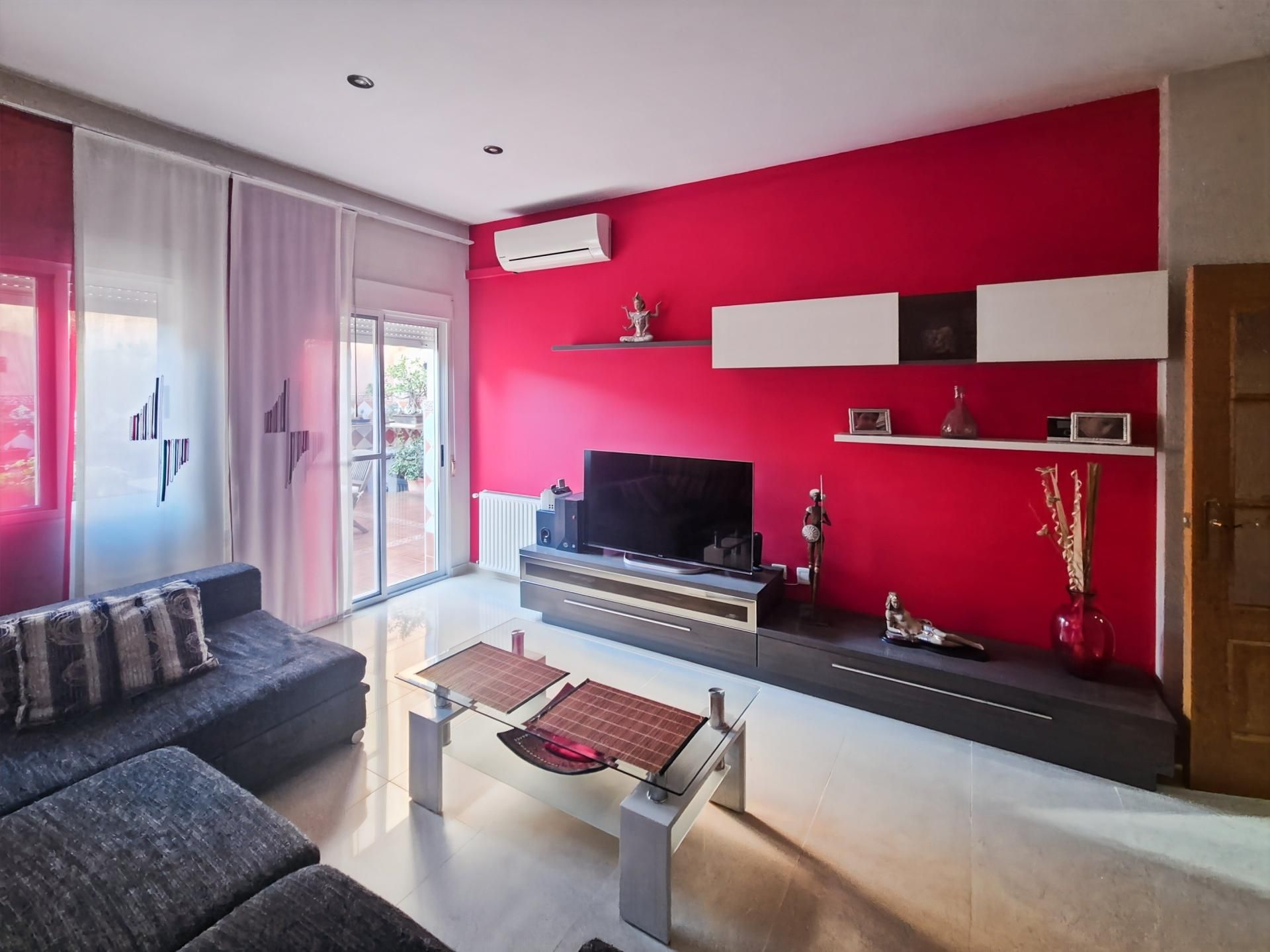 Sala d'estar de Casa adosada en venda en Moncada amb Terrassa i Balcó