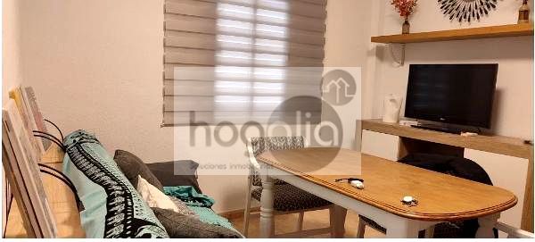 Sala d'estar de Pis de lloguer en  Sevilla Capital amb Aire condicionat, Terrassa i Moblat