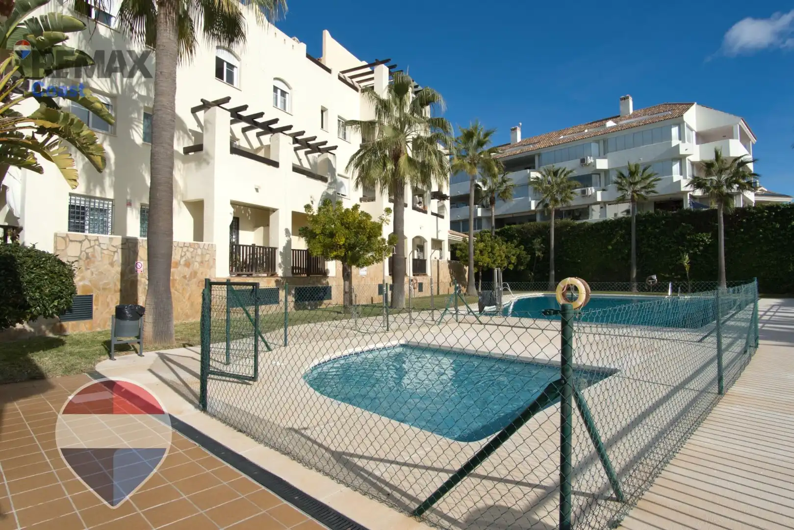 Schwimmbecken von Wohnung zum Verkauf in Benalmádena mit Klimaanlage, Privatgarten und Gemeinschaftspool