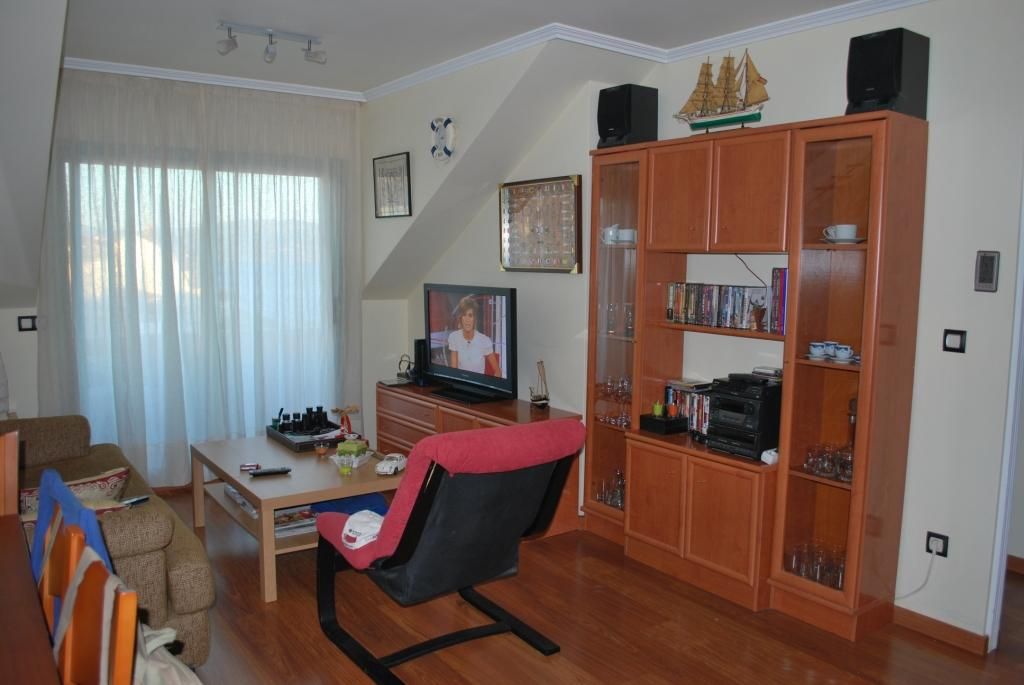 Sala d'estar de Àtic en venda en Sanxenxo amb Calefacció, Parquet i Terrassa