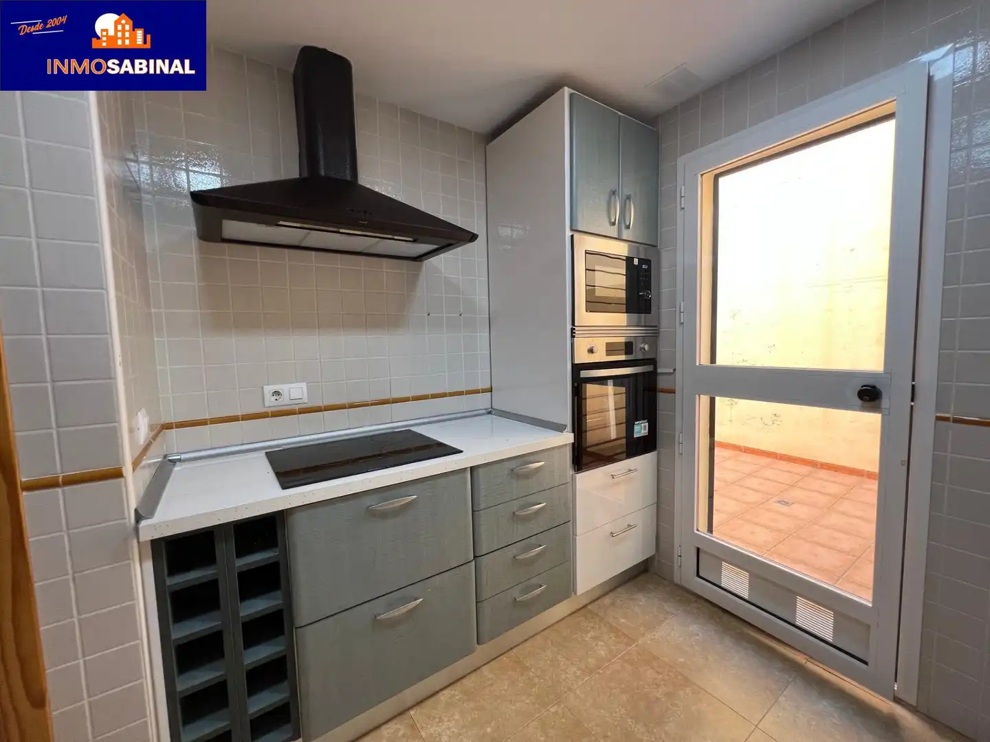 Cocina de Casa adosada de alquiler en Roquetas de Mar con Aire acondicionado, Terraza y Piscina comunitaria