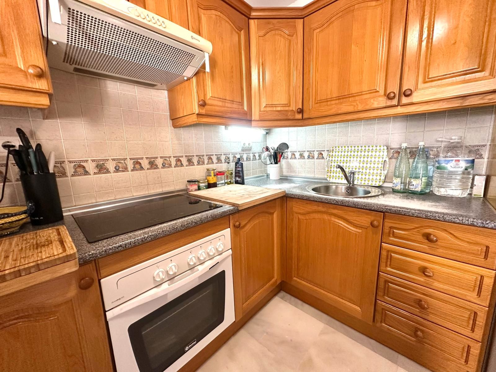 Kitchen of Flat for sale in Benalmádena  with Air Conditioner, Terrace and Community pool
