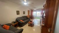 Living room of Flat for sale in El Campello  with Private garden, Balcony and Alarm