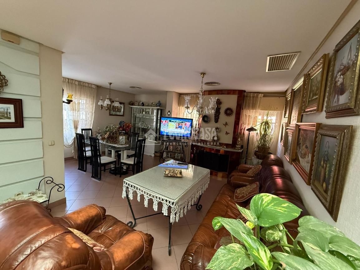 Sala de estar de Casa adosada en venta en Punta Umbría con Aire acondicionado
