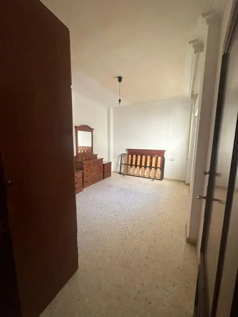 Dormitori de Casa adosada en venda en Dos Hermanas amb Aire condicionat