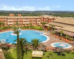 Exterior view of Single-family semi-detached for sale in Chiclana de la Frontera  with Air Conditioner, Private garden and Terrace