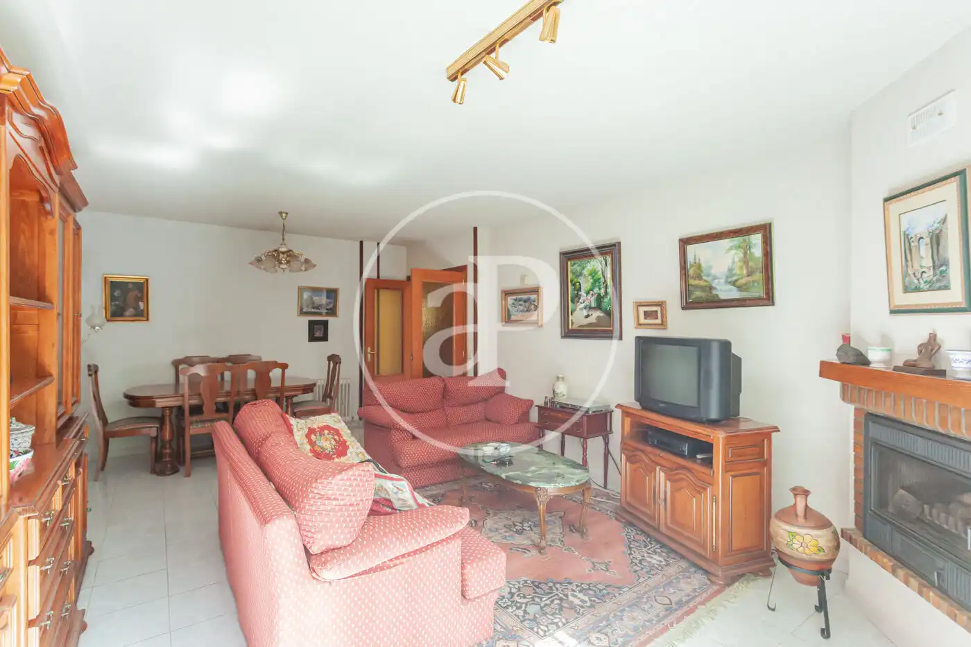 Sala d'estar de Casa adosada en venda en Navacerrada, Madrid