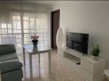 Sala d'estar de Pis de lloguer en  Sevilla Capital amb Aire condicionat