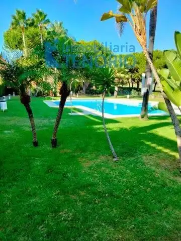 Piscina de Casa adosada en venta en Islantilla con Piscina comunitaria