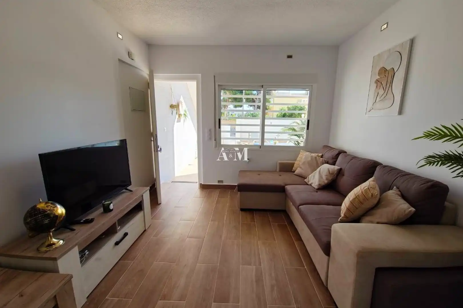 Sala de estar de Casa adosada de alquiler en Orihuela con Aire acondicionado, Terraza y Piscina
