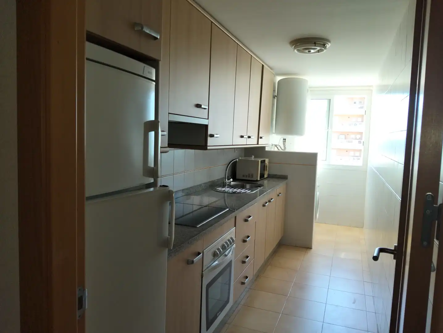 Küche von Wohnung zum Verkauf in La Manga del Mar Menor mit Klimaanlage, Heizung und Privatgarten